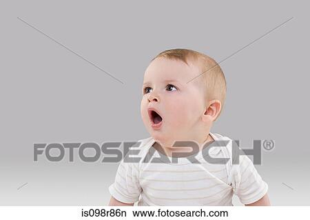 Picture - Baby yawning. Fotosearch