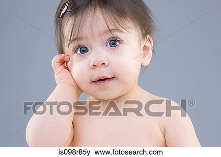 Stock Photo - Portrait of a baby girl. Fotosearch
