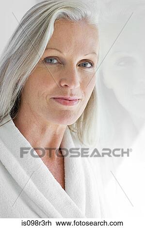 Portrait of middle aged woman wearing bathrobe View Large Photo Image Stock Image - Portrait of middle aged woman wearing bathrobe. Fotosearch