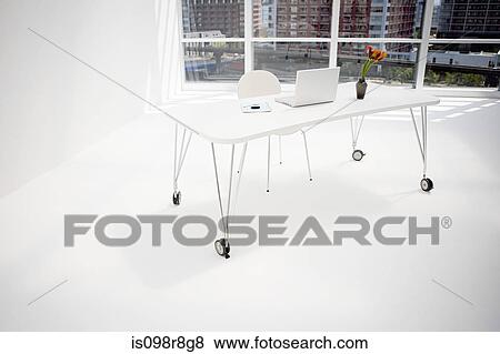 Stock Photo - A sparse white office. Fotosearch