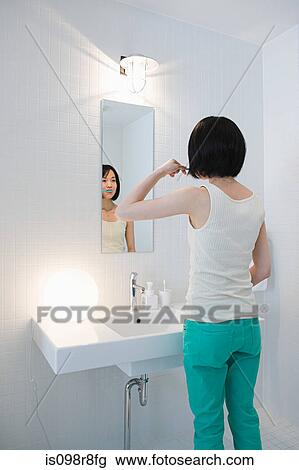 Japanese woman brushing her teeth View Large Photo Image Stock Image - Japanese woman brushing her teeth. Fotosearch
