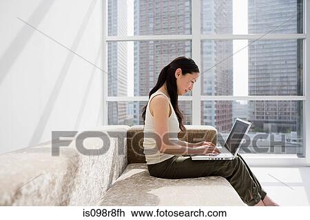Japanese woman telecommuting View Large Photo Image Stock Image - Japanese woman telecommuting. Fotosearch