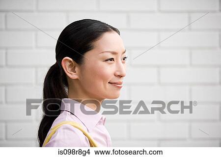 Side view of a japanese woman View Large Photo Image Picture - Side view of a japanese woman. Fotosearch