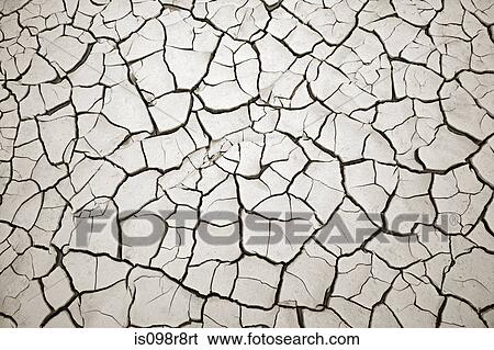 Cracked soil View Large Photo Image Stock Photograph - Cracked soil. Fotosearch