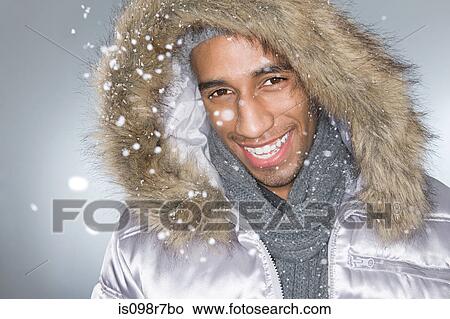 Smiling man wearing a hood View Large Photo Image Picture - Smiling man wearing a hood. Fotosearch