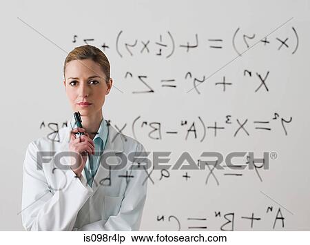 Scientist looking at a formula View Large Photo Image Stock Photography - Scientist looking at a formula. Fotosearch