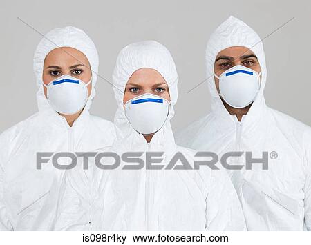 Three scientists wearing protective suits View Large Photo Image Stock Photo - Three scientists wearing protective suits. Fotosearch
