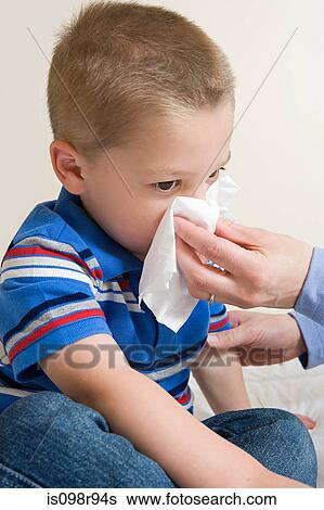 Boy blowing nose View Large Photo Image Stock Photograph - Boy blowing nose. Fotosearch