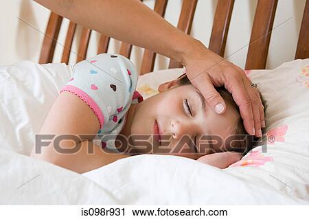 Sleeping girl with adult hand on her head View Large Photo Image Stock Image - Sleeping girl with adult hand on her head. Fotosearch