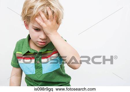 Boy with hand on head View Large Photo Image Stock Photography - Boy with hand on head. Fotosearch