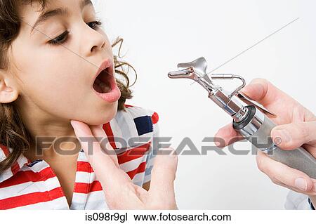 Girl having mouth examined View Large Photo Image Stock Image - Girl having mouth examined. Fotosearch