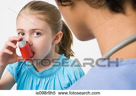 Girl taking asthma inhaler View Large Photo Image Stock Photography - Girl taking asthma inhaler. Fotosearch