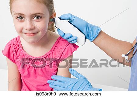 Girl with thermometer in ear View Large Photo Image Stock Image - Girl with thermometer in ear. Fotosearch