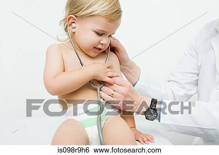 Stock Photograph - Little boy with stethoscope. Fotosearch