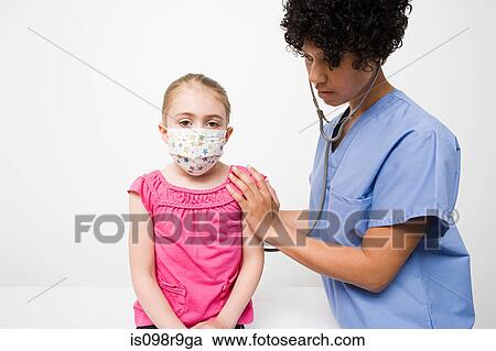Stock Image - Nurse and girl in protective mask. Fotosearch