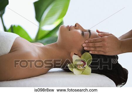 Stock Photo - Woman having a head massage. Fotosearch