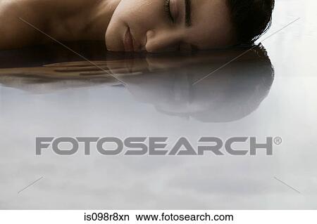 Picture - Young woman in water. Fotosearch