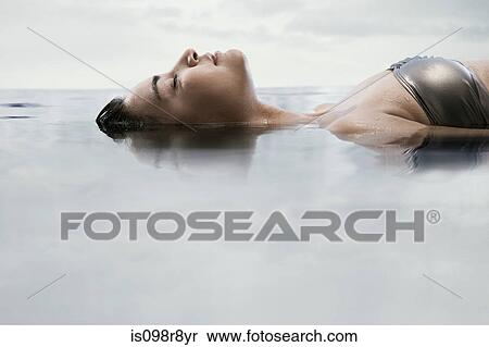 Young woman in water View Large Photo Image Stock Photography - Young woman in water. Fotosearch
