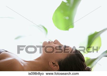 Picture - Young woman with eyes closed. Fotosearch
