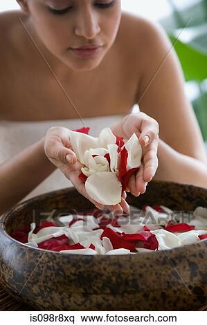 Young woman with petals View Large Photo Image Stock Photography - Young woman with petals. Fotosearch