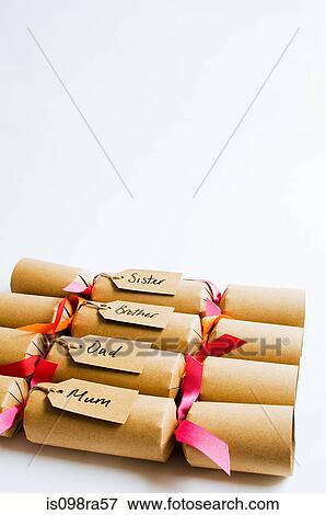 Stock Photo - Christmas crackers for a family. Fotosearch