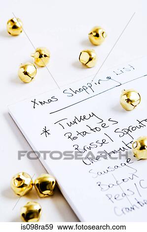 Christmas shopping list and baubles View Large Photo Image Stock Photo - Christmas shopping list and baubles. Fotosearch