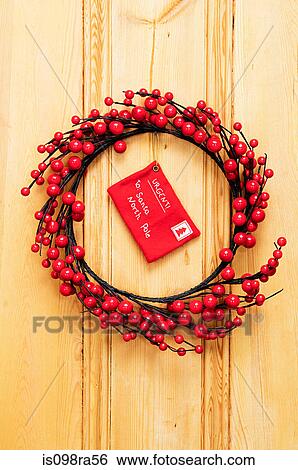 Christmas wreath on door View Large Photo Image Stock Photograph - Christmas wreath on door. Fotosearch