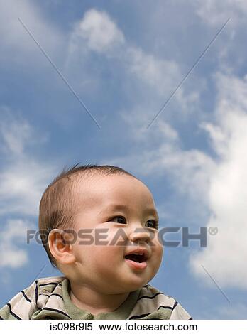 Baby and sky View Large Photo Image Stock Photography - Baby and sky. Fotosearch