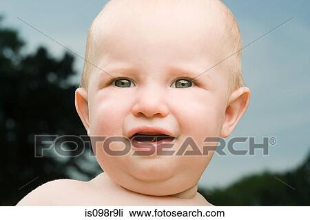 Stock Image - Face of a baby. Fotosearch