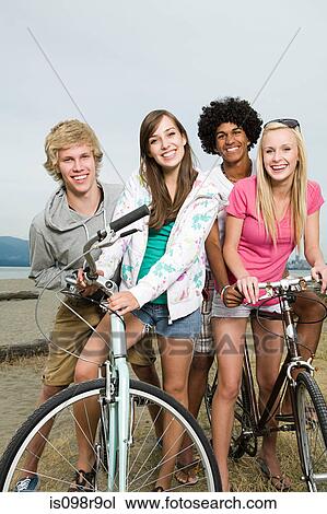 Teenagers with bicycles View Large Photo Image Stock Image - Teenagers with bicycles. Fotosearch