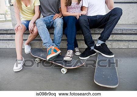 Teenagers with skateboards View Large Photo Image Stock Photography - Teenagers with skateboards. Fotosearch