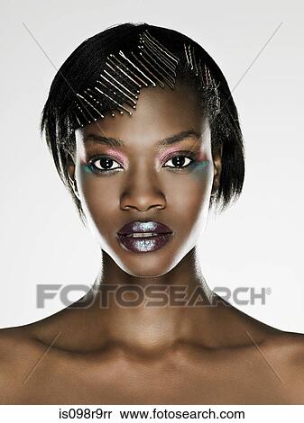 Young woman with hair clips in hair View Large Photo Image Stock Photography - Young woman with hair clips in hair. Fotosearch