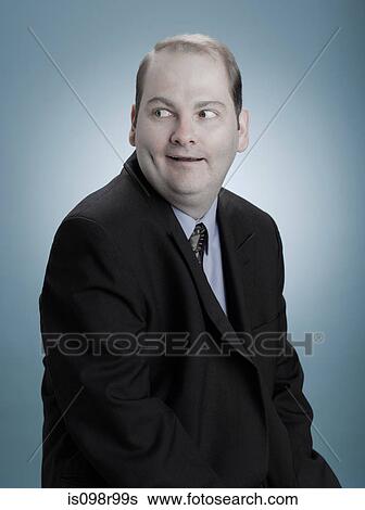 Stock Photograph - Businessman looking sideways. Fotosearch