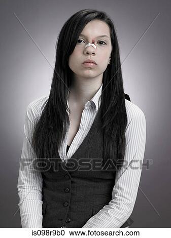 Girl with injured nose View Large Photo Image Stock Image - Girl with injured nose. Fotosearch