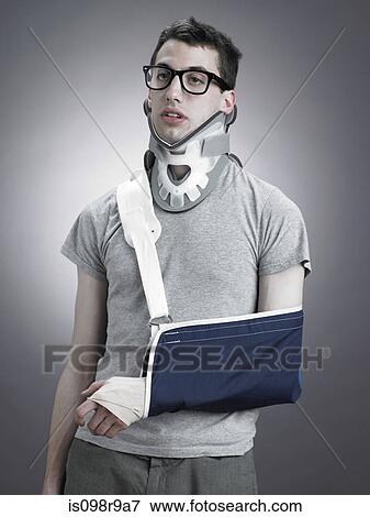Man with neck brace and arm in sling View Large Photo Image Stock Photo - Man with neck brace and arm in sling. Fotosearch