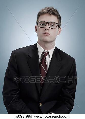 Portrait of a boy in suit and glasses View Large Photo Image Stock Image - Portrait of a boy in suit and glasses. Fotosearch