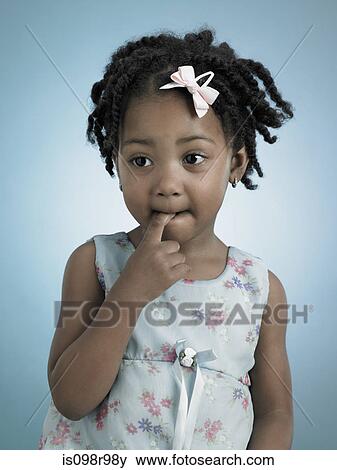 Portrait of a little girl View Large Photo Image Stock Photo - Portrait of a little girl. Fotosearch