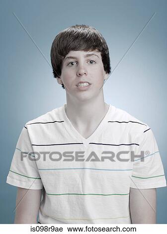 Stock Image - Portrait of a teenage boy. Fotosearch