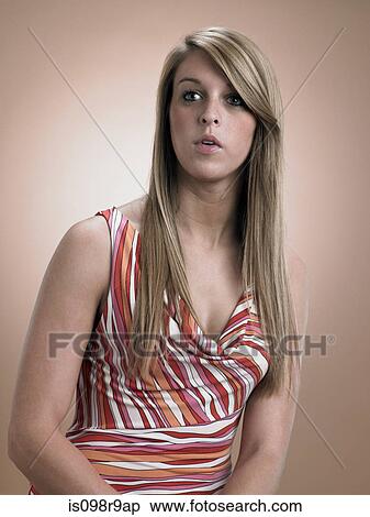 Teenage girl looking awkward View Large Photo Image Stock Photography - Teenage girl looking awkward. Fotosearch