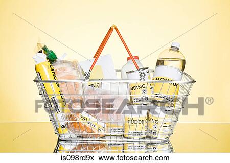 Basket of basic groceries View Large Photo Image Stock Photo - Basket of basic groceries. Fotosearch