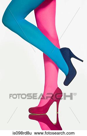 Woman with contrasting tights and shoes View Large Photo Image Stock Photograph - Woman with contrasting tights and shoes. Fotosearch