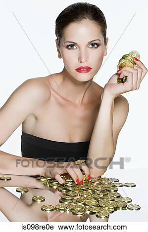 Young woman with coins View Large Photo Image Stock Image - Young woman with coins. Fotosearch