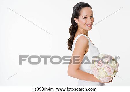 Picture - Bride holding a bouquet. Fotosearch