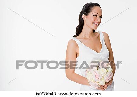 Bride holding a bouquet View Large Photo Image Stock Image - Bride holding a bouquet. Fotosearch
