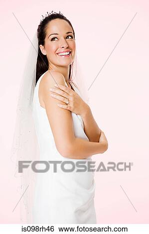Portrait of a smiling bride View Large Photo Image Stock Photograph - Portrait of a smiling bride. Fotosearch
