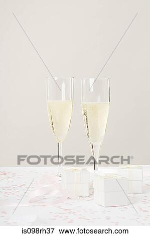Two champagne flutes View Large Photo Image Stock Photo - Two champagne flutes. Fotosearch