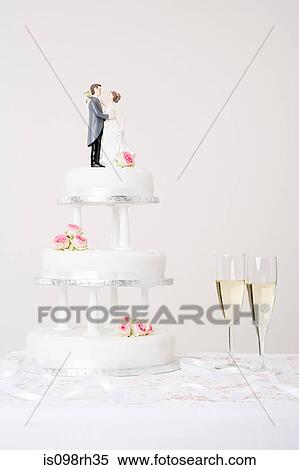 Wedding cake and champagne View Large Photo Image Stock Photography - Wedding cake and champagne. Fotosearch