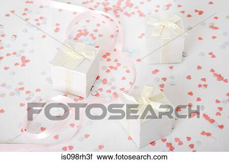 Stock Image - Wedding gifts and confetti. Fotosearch