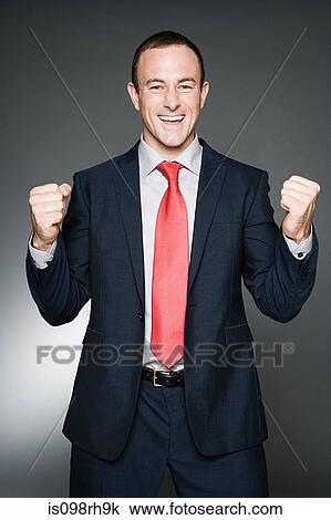 Stock Image - Businessman celebrating. Fotosearch