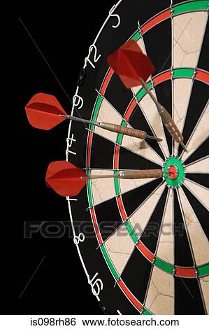 Darts in a dartboard View Large Photo Image Stock Photograph - Darts in a dartboard. Fotosearch